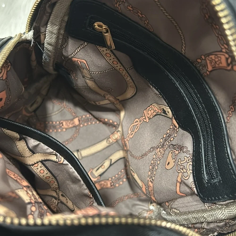 Fashion Inspired Black Leather Bucket Bookbag With Chain Detail